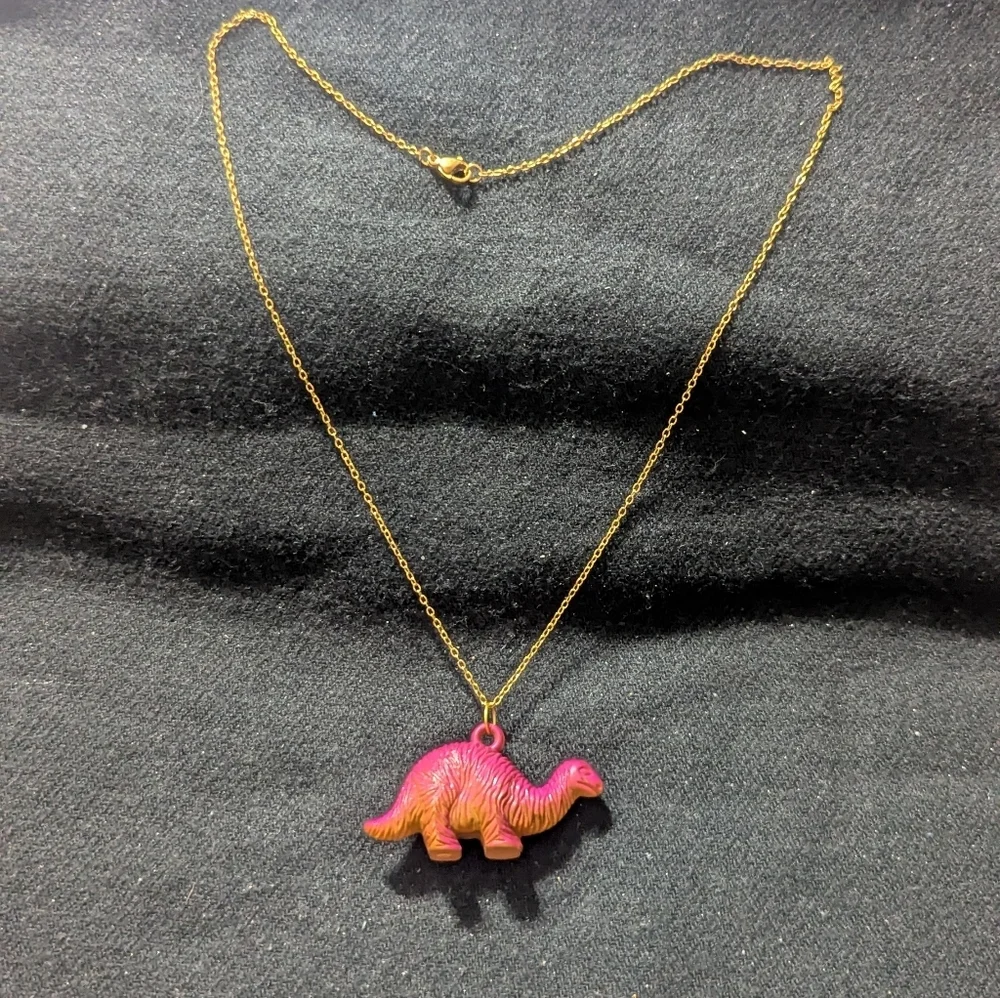 Gold Tone Pink and Orange Dinosaur Pendant Statement Necklace